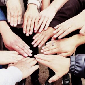 Image of hands coming together